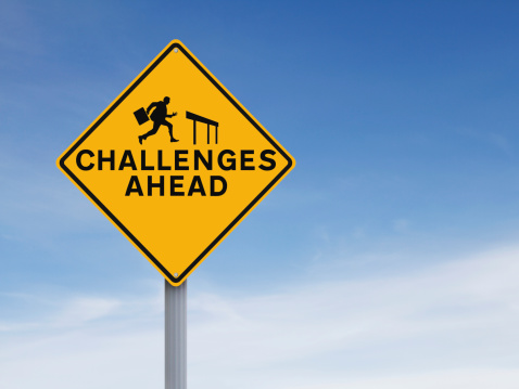 A conceptual road sign on challenges or obstacles