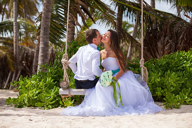istock Young loving couple on the swing 478709438