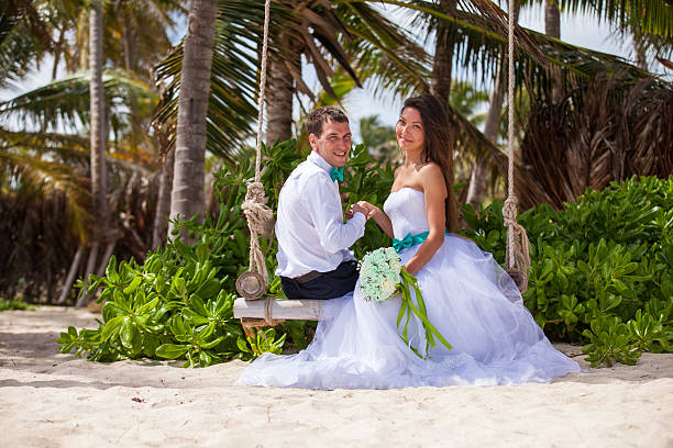 istock Young loving couple on the swing 478709448