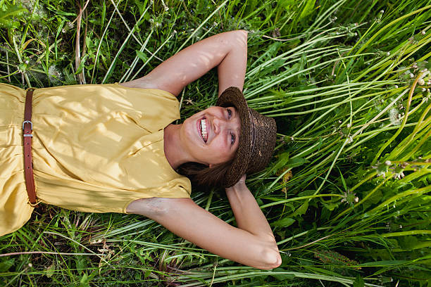 istock girl in a meadow 478709873