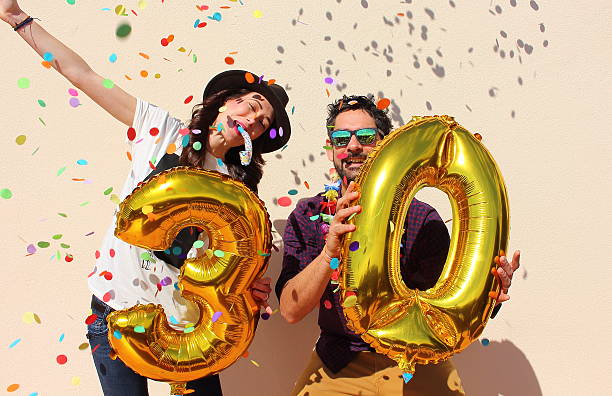 istock Cheerful couple celebrates a thirty years birthday 478713360