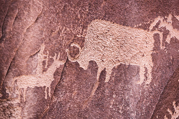 Matobo National Park, Zimbabwe - Rock art paintings on the walls of Pomongwe Cave in the Matobo National Park in Zimbabwe on June 15th 2023. Formerly known as Matobo Hills it is Zimbabwe's oldest national park and a UNESCO World Heritage Site.