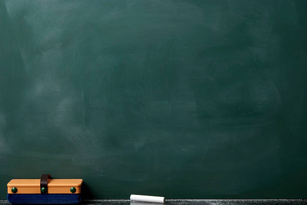 Blank blackboard with board eraser Close-up of blank blackboard with board eraser. chalkboard visual aid stock pictures, royalty-free photos & images