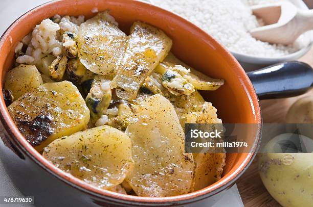 Tiella Of Potatoes Rice And Mussels Stock Photo - Download Image Now - 2015, Carbohydrate - Food Type, Casserole Dish