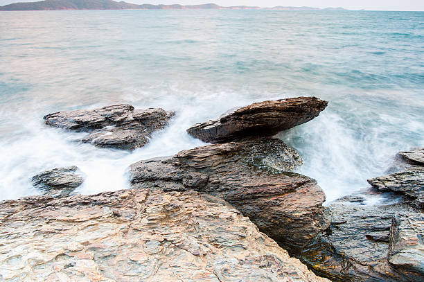 istock sea stones at during rain 478720046