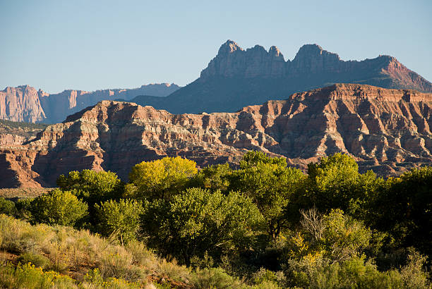 istock Smithsonian Butte Silhouette and Virgin River Valley Utah 478723885