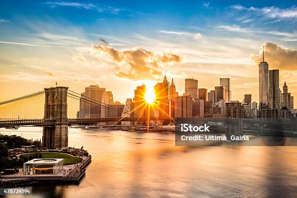 Brooklyn Bridge And The Lower Manhattan Skyline At Sunset Stock Photo - Download Image Now