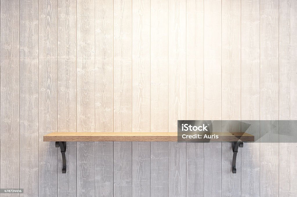 empty book shelf empty book shelf on wooden wall Shelf Stock Photo