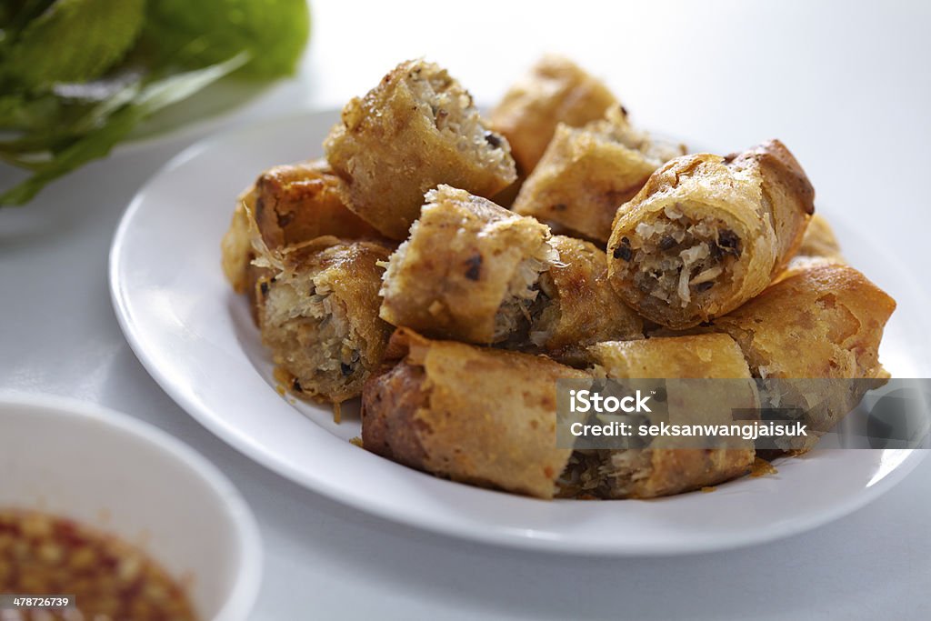 spring roll spring roll on white table Appetizer Stock Photo