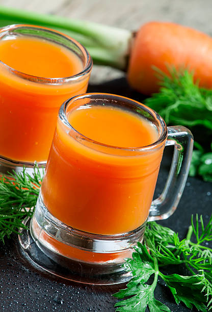 istock Fresh carrot diet  juice  in old-fashioned glass mug 478729958
