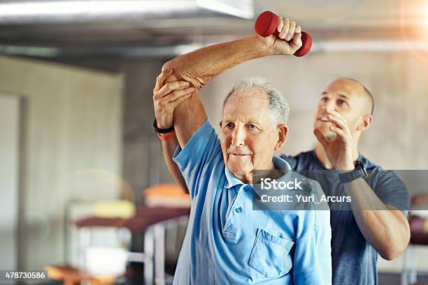 Not Letting Age Affect His Agility Stock Photo - Download Image Now - Senior Adult, Exercising, Physical Therapy