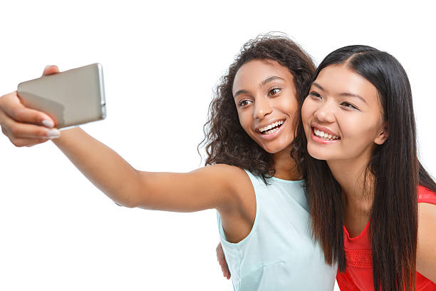 istock Positive girls making photos 478732196