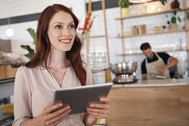 istock Thinking of new menu ideas for her cafe 478735220