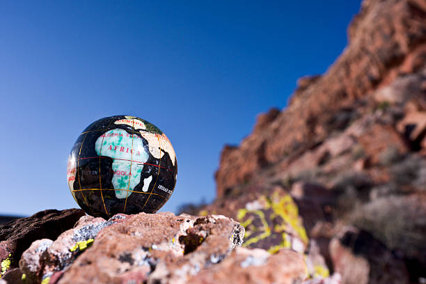 istock Black Globe and Sandstone Hills - Africa 478736655