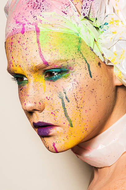 istock Woman with colorful makeup 478736872
