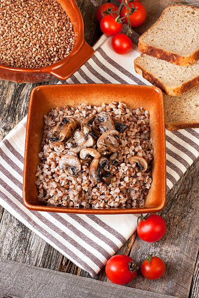 istock Buckwheat porridge with mushrooms 478736916
