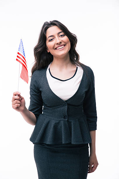 istock Smiling businesswoman holding US flag 478741000