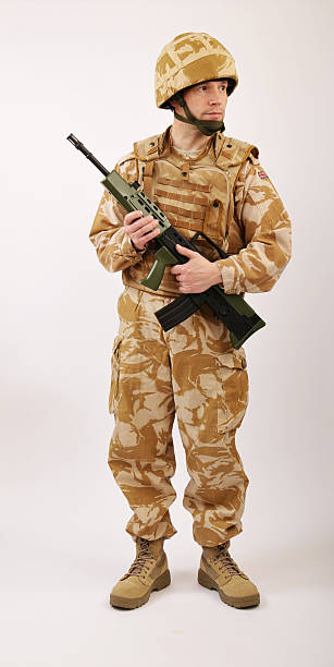 istock Desert Camouflage Soldier With Rifle 478742299