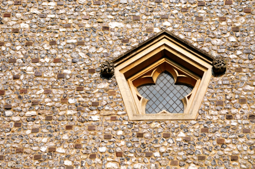 A pentagon shaped window belonging to St.Michael's Church,St.Albans,Hertfordshire,UK. The 11th century church was built using the ruins from the old Roman city of Verulamium.