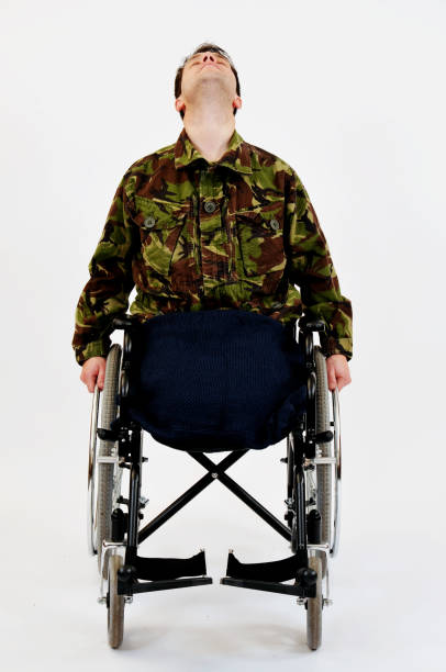 istock Distraught Amputee Soldier In Wheelchair 478743043