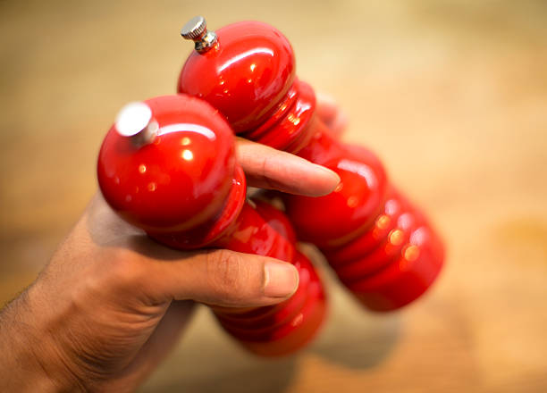 red salt and pepper shaker stock photo