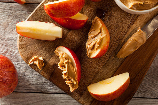 istock Organic Apples and Peanut Butter 478744192