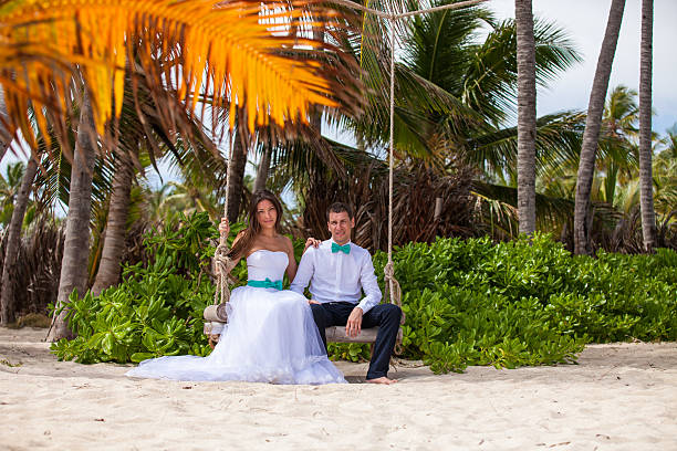 istock Young loving couple on the swing 478745138