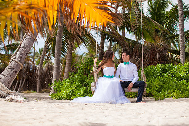 istock Young loving couple on the swing 478745172