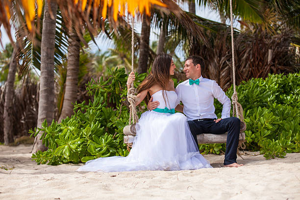istock Young loving couple on the swing 478745174