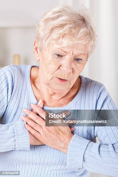 Elderly Lady With Chest Pain Stock Photo - Download Image Now - Women, One Woman Only, Pain