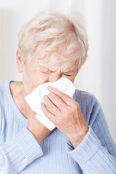 istock Senior lady with running nose 478746553