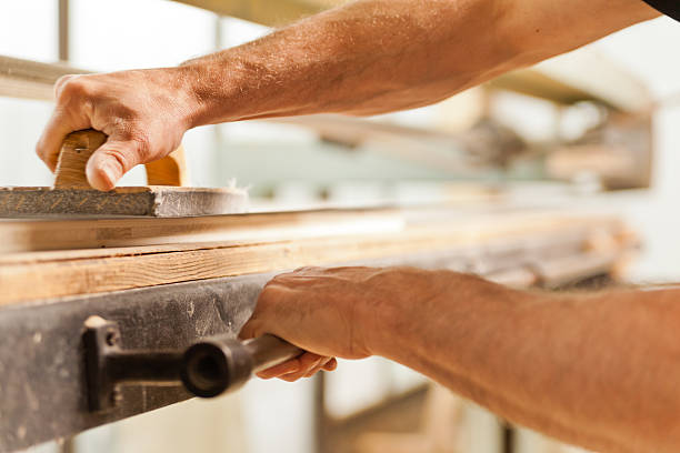 istock wood smoothing with belt sander 478748140