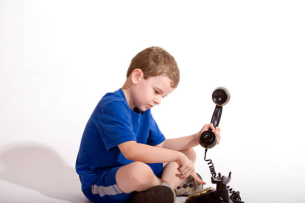 istock Young boy with a phone 478755179