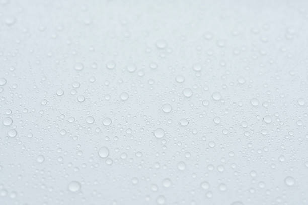istock Water droplets of white car 478755200