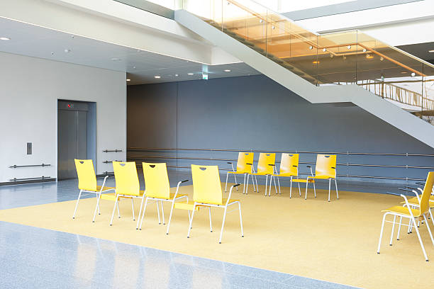 istock Waiting Area with Stairs and Yellow Chairs 478757855