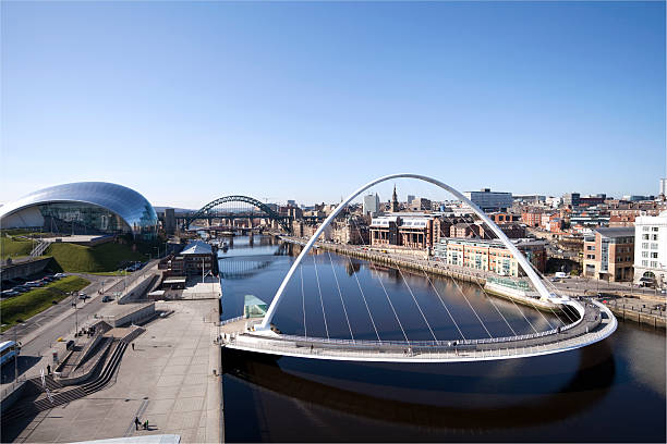 Tyne Quayside, Newcastle Newcastle-upon-Tyne cityscape, showing the Gateshead Millennium bridge, the Tyne Bridge and the Sage Gateshead. quayside photos stock pictures, royalty-free photos & images
