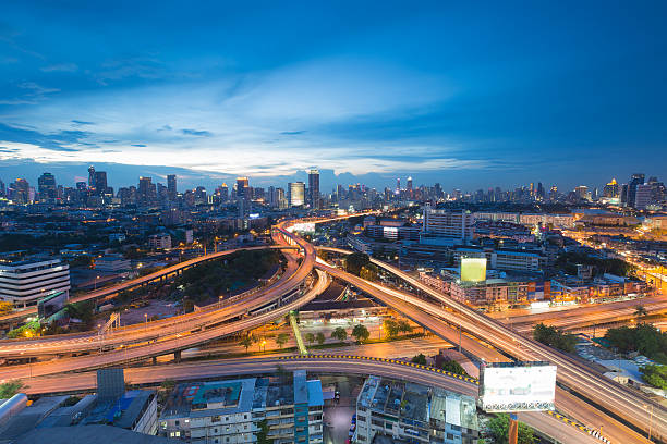 istock Twilight of cityscape overpass lights aerial view 478760344