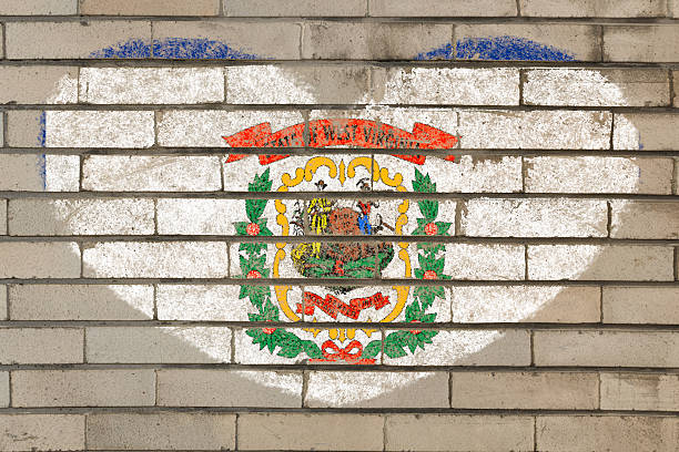 istock heart shape flag of west virginia on brick wall 478764106