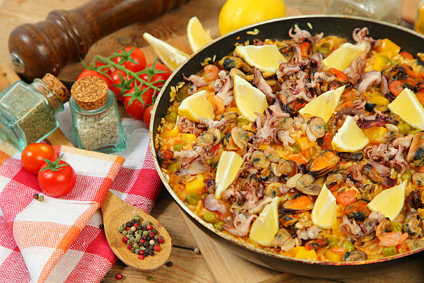 Paella and vegetables stock photo