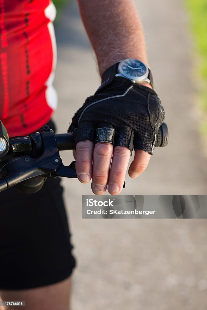 Hand of a cylist Hand of a cylist at the brake 2015 Stock Photo