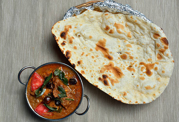 istock Naan bread with chicken chettinad 478769172
