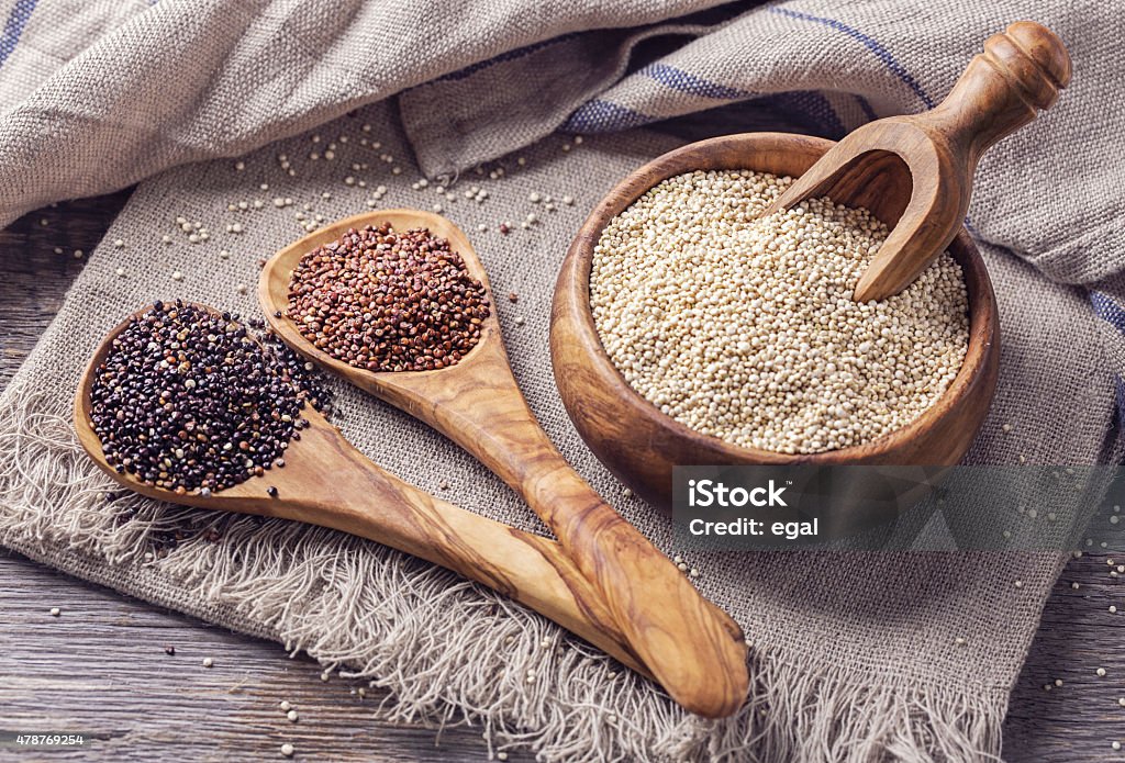 Red, black and white quinoa seeds Red, black and white quinoa seeds on a white background Quinoa Stock Photo
