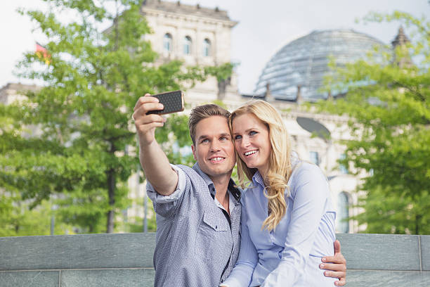 istock Couple taking selfie with The Reichstag in background (Berlin, Germany) 478769320