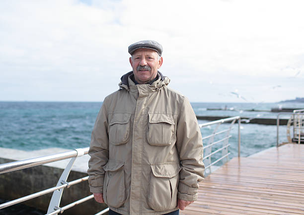 istock Senior man against the sea 478770098