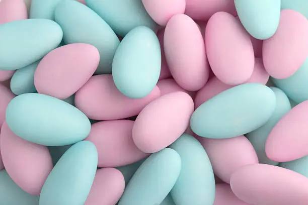 background of pink and blue sugared almonds