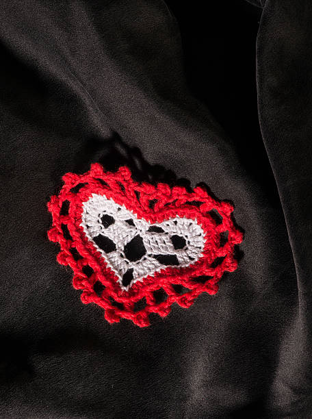istock Heart shape made of red textile 478779545