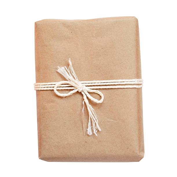 istock Package wrapped in kraft paper and tied with a rope 478780788