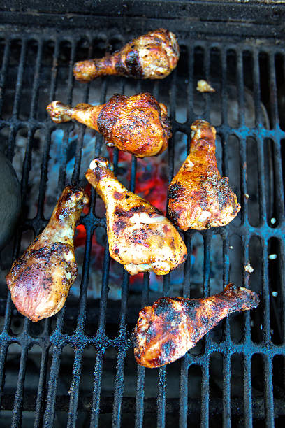 istock Grilled Chicken Legs on a Charcoal Grill 478780976