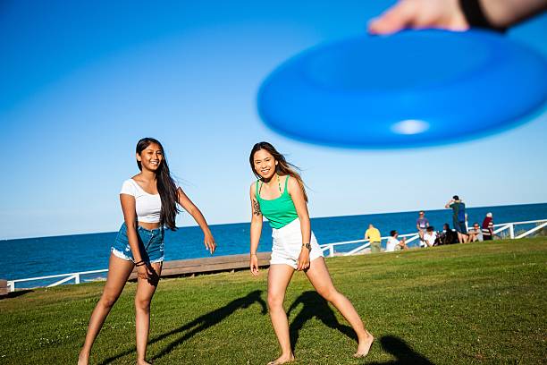istock Happy friends playing at the park in summer 478785942