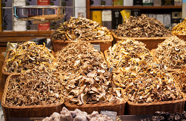 istock Dried mushrooms exposed  in a market 478787390